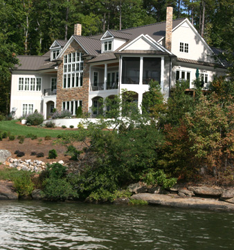 large house above body of water